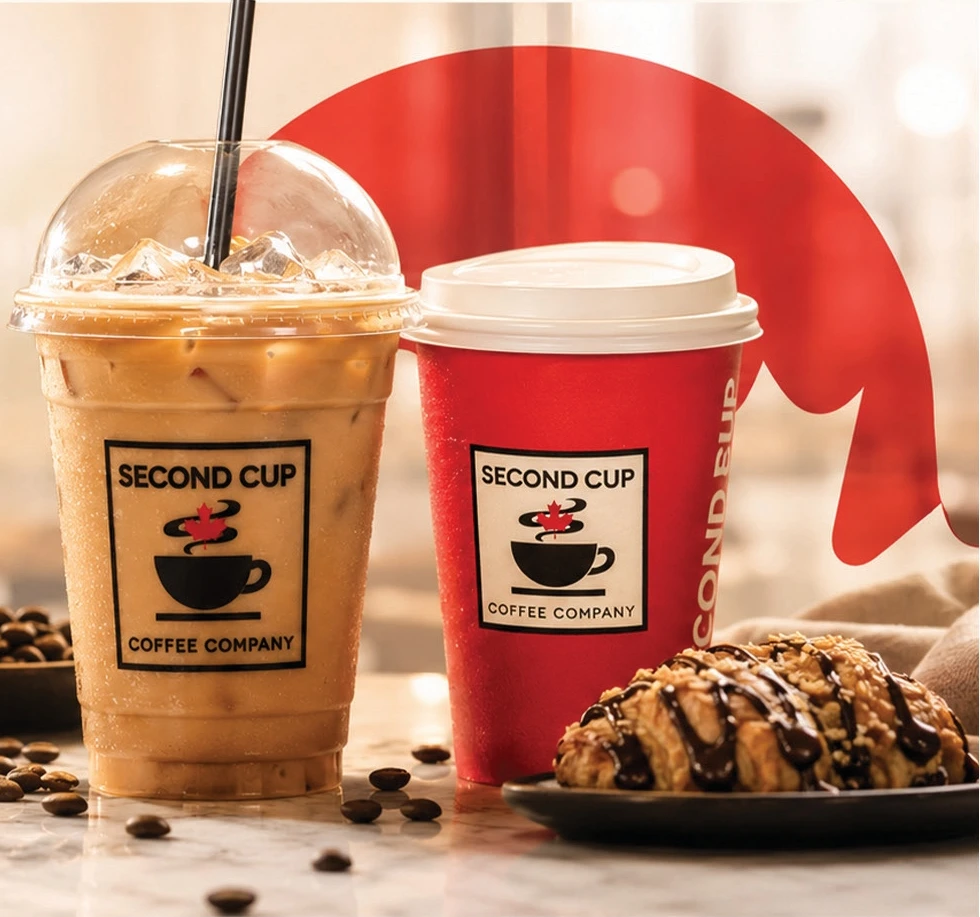 Iced coffee and a red Second Cup takeaway cup with a croissant